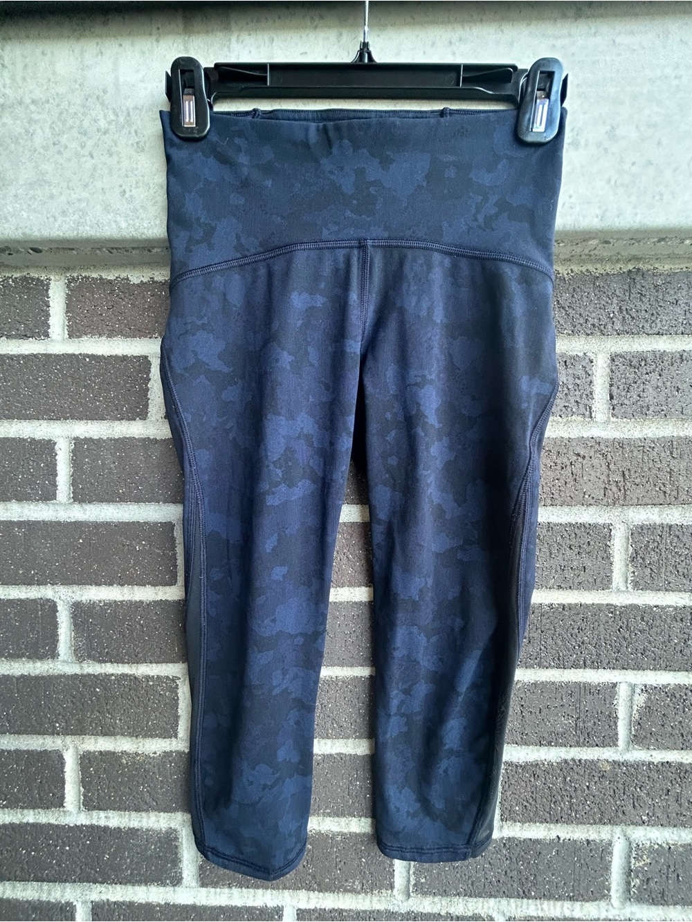 LULULEMON Train Times Crops in a Navy and Black Camo print, Size 4
